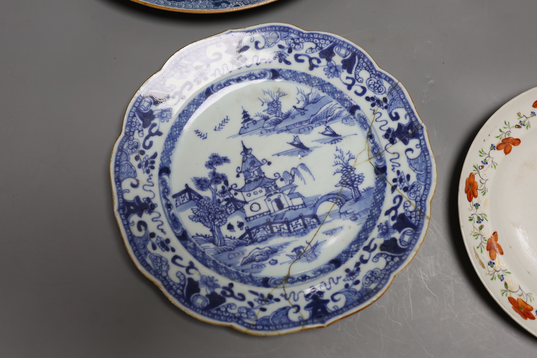 Four 18th / 19th century Chinese plates, and a later dish, largest plate 29cms diameter